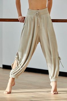 Goldie Drawstring Waistband Hi-Rise Sweatpant These cool and comfortable, slouchy high-rise harem sweatpants are a great statement piece. Drawstring waistband Cinched ankles Hip pockets FP Movement A destination for the life well-lived, Free People Movement offers performance-ready activewear, practice-perfect styles and beyond-the-gym staples. We believe in the power of community, in supporting and lifting each other up and always #movingtogether. Care/Import Machine Wash Cold Import Measuremen Harem Sweatpants, Estilo Hippie, Yoga Journal, Yoga Pants Outfit, Comfy Pants, Yoga Sequences, Yoga Pants Women, Yoga Fashion, Loose Pants