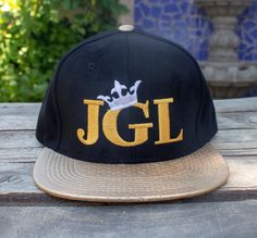 new El Chapo Guzman JGL embroidered  hat Gold Snapback Hat With Flat Brim For Streetwear, Gold Snapback Baseball Cap For Streetwear, Custom Logo Snapback Baseball Cap For Streetwear, Custom Logo Snapback Baseball Cap, Gold Baseball Cap For Streetwear, Gold Snapback Hat With Adjustable Flat Brim, Gold Flat Bill Hat For Streetwear, Adjustable Gold Snapback Hat With Flat Brim, Gold Adjustable Flat Bill Baseball Cap