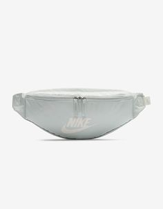 Nike Heritage Waist Pack. A Comfortable And Easy To Adjust Strap Makes The Nike Heritage Waist Pack A No Brainer For Everyday Trips. The Main Compartment Provides Secure Storage For Your Phone, Snacks Or Wallet While The Smaller Accessories Pocket On The Backside Helps Keep Things Like Your Keys, Travel Info Safe And Close At Hand. The Buckle Snaps Together In The Middle Of The Strap For A Comfortable, Easy-To-Adjust Fit. The Bag Can Be Worn At Your Waist, Across Your Body Or Over Your Shoulder. Hip Pack, Pack Bag, Trendy Shoulder Bag, Adjustable Bag, Travel Info, Waist Bags, Waist Pack, Small Accessories, Nike Sportswear