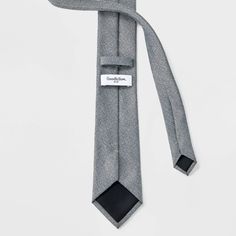 Add classic flair to your formal outfits with this Plaid Necktie from Goodfellow & Co™. This necktie is woven from lightweight fabric with full lining for comfortable wear. Pair it with your favorite dress shirt, trousers and suit jacket to complete your look for a variety of formal or semi-formal occasions. Goodfellow & Co™: Feel good in what you wear, anywhere. Classic Gray Suit And Tie Accessories For Formal Occasions, Classic Gray Suit And Tie Accessories For Formal Events, Classic Gray Suit And Tie Accessories, Tailored Suit And Standard Tie Accessories For Semi-formal Occasions, Tailored Professional Standard Tie, Semi-formal Tailored Suit And Tie Accessories, Gray Standard Tie For Formal Occasions, Classic Gray Tie For Black Tie Events, Classic Gray Standard Tie And Suit Accessories