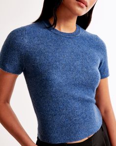 Elevate your everyday style with the Abercrombie & Fitch Women's Crew Sweater Tee. This chic, slim-fitting top is crafted from a luxuriously soft sweater yarn fabric, ensuring both comfort and a flattering fit.

- Size: Medium
- Color: Blue
- Material: Polyester, Nylon, Acrylic
- Gender: Female
- Features: Crew neckline, short sleeves, rib trim details on the banded hem and cuffs

Perfect for pairing with your favorite skirt or jeans, this versatile tee blends casual comfort with sophisticated s Female Features, Lounge Sweater, Soft Sweater, Comfy Fashion, Softest Sweater, Sweaters Oversized, Everyday Style, Women's Tops, Jacket Tops