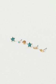 Set of 40 small delicate studs including 13 sets with shimmering stones and 7 sets with fun metal shapes. Easily mix and match to create your unique look. | Teeny Tiny Mega Stud Earring Set by Free People in Blue Starter Earrings, Natural Essence, Cute Stud Earrings, Tiny Studs, Tiny Stud Earrings, Earrings Studs, Natural Face, Trendy Earrings, Jewelry Outfit