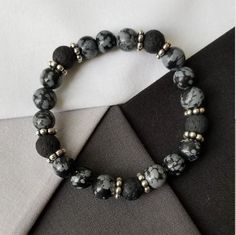 Black & Gray Jasper and Lava bead bracelet. It is approximately 7 inches long. Boy Bracelets, Boys Bracelet, Men Beaded Bracelet, Cloudy Night, Beaded Bracelet For Men, Boys Bracelets, Lava Bead Bracelet, Bracelets Design, Diy Bracelet Designs