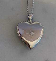 "Diamond Heart Locket in Sterling Silver, * 3/4 Inch Pendant * Holds 2 Photos * Solid 925 Sterling Silver, NOT Plated * Chain in 6 Lengths, 16\", 18\", 20\", 22\", 24\", 30\" * Gift for Women: Mother, Grandmother, Daughter, Sister, Wife, Friend * Rhodium Anti-Tarnish 🎁Packaging: This item comes gently packaged in a fabric pouch housed inside of a silver foil linen box with a silver bow. It is ready to present as a gift to someone special or to keep as a gift to yourself! 🚛 Shipping: Shipped fr Luxury Sentimental Heart-shaped Jewelry, Affordable Silver Heart Locket Necklace, Cheap Silver Heart Locket Necklace, Cheap Silver Pendant Locket Necklace, Affordable Silver Round Locket Necklace, Silver Locket Necklace Aesthetic, Cute Gifts Ideas For Friends, Silver Locket Aesthetic, Silver Heart Locket Necklace