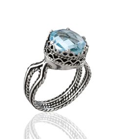 Looking for the perfect gift for your loved ones? Look no further than this stunning silver filigree art women's cocktail ring! With its intricate details and beautiful design, this ring is sure to make a lasting impression. Featuring a double-sided faceted checkerboard round-cut blue topaz gemstone that is 10mm in size and a 0.47"/12.00mm face width, this ring is simply gorgeous when worn. This stunning piece comes with a velvet pouch, silver polish cloth, and a luxurious gift box, making it th Birthday Gemstones, Red Topaz, Gorgeous Style, Blue Topaz Gemstone, Blue Stone Ring, Sterling Silver Filigree, Double Heart, Gifts For Your Girlfriend, Blue Topaz Ring