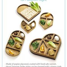 an ad for the heart tangram seed plate, with four trays filled with food