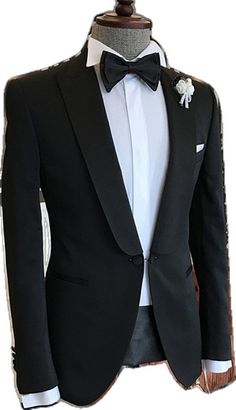 Black Tie Single Button Blazer With Notch Lapel, Single Button Notch Lapel Blazer For Black Tie, Notch Lapel Single Button Blazer For Black Tie, Professional Tailored Single Button Tuxedo, Tailored Single Button Professional Tuxedo, Semi-formal Tuxedo Suit And Tie Accessories, Professional Tuxedo For Black-tie Events With Suit Collar, Single Button Tuxedo Blazer For Formal Occasions, Formal Single Button Tuxedo Blazer