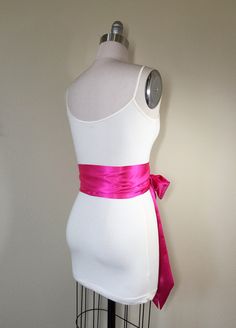 "Shocking Pink Sash Pink Satin Sash Belt Obi Belt, Bright Pink Hot Pink Sash Wedding Sash, Bridal Sash Bridesmaid Dress Sash Satin Swank Make this Satin Swank® reversible waist sash the perfect finishing touch for your wedding, bridesmaid, or special occasion dress, or just the right piece to add instant polish to your dress or top. This extra long version is 3.5 inches wide, 120 inches long, and will wrap around most waist sizes two times with a generous length remaining to tie in a bow or a si Elegant Fitted Pink Sashes, Satin Bridal Belt For Bridesmaids, Fitted Satin Bow Sash For Bridesmaids, Pink Bridal Belt With Sashes For Party, Fitted Sashes With Satin Bow, Fitted Bridesmaid Sash, Pink Sash, Wedding Sash Belt, Waist Sash