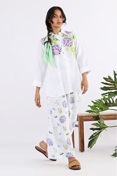 White A-line shirt with floral applique work. - Aza Fashions Spring Floral Embroidery Relaxed Fit Shirt, Spring White Blouse With Floral Applique, Summer Floral Applique T-shirt With Crew Neck, White Crew Neck T-shirt With Floral Applique, Cheap T-shirt With Floral Applique, Womens Work Shirt, Casual Cotton T-shirt With Floral Applique, Floral Applique, Work Shirts