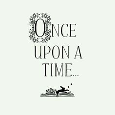 an open book with the words once upon a time written in black and white on it