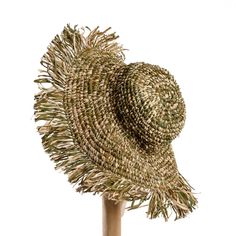 You may wear it, or you may use it as a beautiful wall decor! This lovely summer hat is perfect for any occasion. With shades of army green, it's a great addition to your wardrobe. It's made from raffia in various natural tones, making it lightweight and easy to wear. Put on your summer sandals and let the fun begin!Let's have some fun with this beautiful and unique piece, handcrafted from sustainable materials.‎ Each piece celebrates the natural characteristics inherent in the materials. Fashio Let The Fun Begin, Summer Hat, Summer Sandals, Banana Leaf, Natural Tones, Summer Hats, Sustainable Materials, Beautiful Wall, Have Some Fun