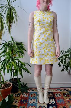 "Yellow and White Sixties/Seventies Mini Mod Dress by \"Lanz Originals\". Hook and Eye Wrap Back Closure. Asymmetrical Bow Detail. Empire Waist. Lined Bodice. Skirt Unlined. No Content Label Excellent Vintage Condition - minor armpit discolouration Fits Size Small/Extra Small Chest - 34\" Waist - 29\" Hip - 38\" Length - 32\" All Sales Are Final. We have taken the time to note all size measurements and the condition of each piece so please look over all the information of the garment you are con Cotton Lined Mod Dress, Mod Style Cotton Lined Dresses, Mod Mini Dress For Spring, Mod Style Cotton Dress With Lining, Cotton Mod Dress With Lining, Spring Fitted Mod Mini Dress, Fitted Mod Mini Dress For Spring, Lined Mod Summer Dresses, Summer A-line Mod Mini Dress