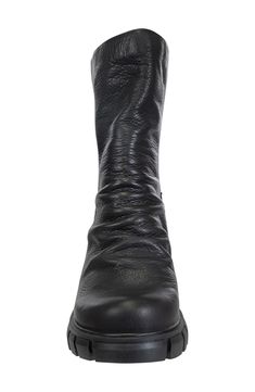 A heavily lugged sole gives an edgy vibe to this sleek leather boot inspired by combat styles and crafted with a cushioned insole for comfy stepping. 2 1/4" heel 7 1/4" shaft Removable, cushioned insole Leather upper/textile lining/rubber sole Imported Edgy High Ankle Leather Combat Boots, Edgy Leather High Ankle Combat Boots, Edgy Leather Lace-up Boots With Lug Sole, Punk Leather Lace-up Boots With Lug Sole, Edgy High Ankle Wedge Boots With Lug Sole, Leather Mid-calf Boots With Lug Sole, Edgy Leather Boots With Lug Sole, Edgy Leather Boots With Rubber Sole, Edgy Ankle Combat Boots With Vibram Sole