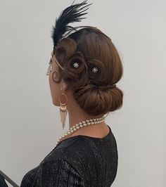 1920s Hairstyles for Long Hair: 21 Styling Ideas 1920s Hairstyles For Long Hair Updo, 20s Updos For Long Hair, Hairstyles 1920s Gatsby, 20s Hairstyles Long Hair, 1920s Side Bun, How To 1920s Hairstyles For Long Hair, 1920s Bun Hairstyle, 1920s Hair Updo Gatsby, Roaring Twenties Hairstyles Long