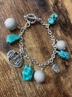 Vintage retro chunky charm bracelet silver tone metal turquoise blue gemstones  musical notes acting actor themed 20cm Turquoise Metal Charm Bracelet As Gift, Turquoise Metal Charm Bracelet Gift, Adjustable Turquoise Metal Charm Bracelet, Adjustable Metal Music-themed Jewelry, Silver Music-themed Charm Jewelry, Silver Music-themed Jewelry With Charms, Silver Music-themed Metal Jewelry, Music-themed Silver Metal Jewelry, Nickel-free Metal Music-themed Jewelry