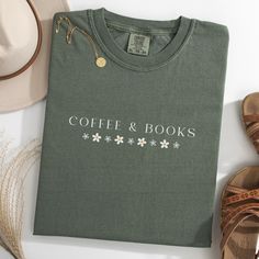 Wonderful design for women who loves Coffee & Book lover letter design shirt.Grab this design as a gift for your girlfriend,sister,mother or who loves Coffee & Book shirt.Or make yourself happy to have this cute design tshirt :) A Coffee & Book shirt is a type of tshirt that features a design inspired by the book lovers.Coffee & Book shirts are popular among book letter tshirt lovers and make a great gift for any book lovers enthusiast. 🌿 Made from premium quality, soft cotton fabric, this shir Letter Tshirt, Coffee Book, Book Shirt, Bookclub Gifts, Lover Sweatshirt, Book Letters, Coffee Lover Gift, Design Tshirt, Letter Design