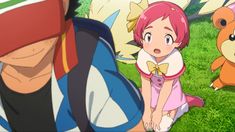 an anime character sitting in the grass with other characters behind him and one person standing next to her