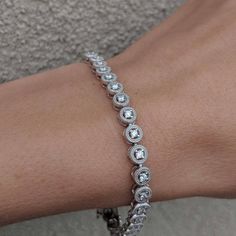 We took a classic tennis bracelet and added vintage charm with delicate milgrain detailing. The bracelet is finished with a box clasp with locking hinge for added security. This bracelet is fully customizable. If you prefer 18k gold or platinum, different dimensions, different quality diamonds or moissanites or colored gemstones, please contact us: http://etsy.me/1231fkN Details: - Solid 14k yellow or white gold - Bracelet is 7 inches in length. For different lengths, please contact us. - SI+G/H Oval Tennis Bracelet With Diamond Accents For Formal Events, Oval Tennis Bracelet With Diamond Accents For Formal Occasions, Classic Oval Diamond Bracelet With Accents, Classic Oval Bracelets With Diamond Accents, Classic Oval Diamond Bracelet For Anniversary, Formal Diamond White Tennis Bracelet With Bezel Setting, White Gold Tennis Bracelet With Bezel Setting, Classic Oval Diamond White Tennis Bracelet, Classic Oval Bracelet In Diamond White