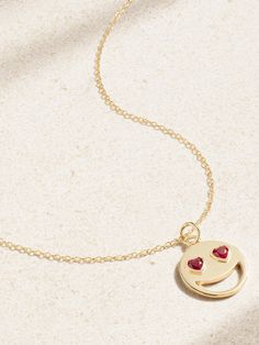 Alison Lou's 'Lover' necklace is strung with a smiley face pendant that has heart-shaped laboratory-grown rubies for eyes. It's handmade from 14-karat gold and has a delicate, adjustable chain. Gift it to someone special. Lover Necklace, Alison Lou, Face Pendant, Face Necklace, Lovers Necklace, Heart Shaped Necklace, Enamel Necklaces, Ruby Necklace, For Eyes