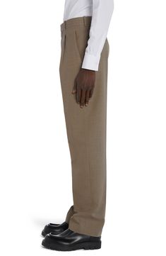 A high waist emphasizes the streamlined profile of dress pants tailored from softly brushed wool twill with crisp knife pleats smartly detailing the front. 27 1/2" inseam; 19" leg opening; 12" front rise; 16" back rise (size Medium) Zip fly Front slant pockets; back welt and button-welt pockets 100% wool Dry clean Made in Italy Designer Clothing Beige Wool Pants For Business Casual, Classic Beige Wool Pants, Classic Beige Dress Pants For Office, Beige Formal Dress Pants With Straight Hem, Classic Pleated Wool Bottoms, Elegant Beige Wool Bottoms, Classic Wool Pleated Bottoms, Elegant Wool Beige Bottoms, Elegant Pleated Beige Pants