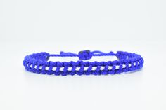 Fashionable and durable hand-made blue bracelet with a white line, adjustable to fit wrist sizes from 6 to 9 inches, Made from high quality string, it will be sure to last. Each bracelet is carefully handcrafted and give proper time to ensure quality. Fast & Free shipping White Braided Bracelets With Sliding Knot Nylon Cord, White Braided Nylon Cord Bracelet With Adjustable Length, White Braided Bracelet With Sliding Knot Nylon Cord, White Braided Beaded Bracelets As Gift, White Braided Bracelets With Adjustable Length, White Braided Bracelet With Adjustable Length, White Braided Bracelet With Sliding Knot, Adjustable White Friendship Bracelets, White Nylon Cord Friendship Bracelet