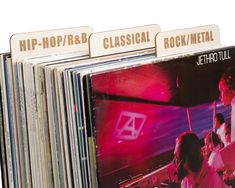 several records stacked on top of each other in front of a white background with the words hip - hop / r & b classical rock'n metal