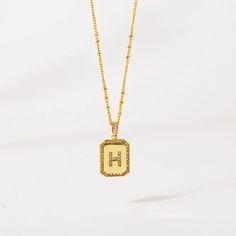 Gold Initial Pendant Necklace 18-20"– Think Goodness Gold Charm Necklace With Letter Beads Initial Pendant, Gold Charm Necklace With Initial Pendant And Letter Beads, Gold Initial Necklace With Rectangular Pendant, Gold Initial Necklace With Letter Beads For Anniversary, Gold Monogram Initial Pendant Necklace, Gold Initial Pendant Necklace With Name, Elegant Gold Letter Bead Necklaces, Gold Monogram Charm Necklaces For Mother's Day, Gold Square Pendant Initial Necklace For Anniversary