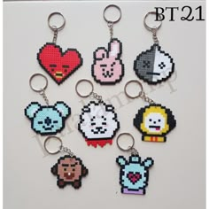 the pixel keychains are all different colors and designs, but one is for each character