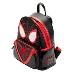 a black and red spiderman backpack with white eyes