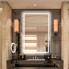 a bathroom with a sink, mirror and lights