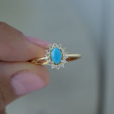 Looking for a stunning turquoise ring? Look no further! The turquoise is set against a cubic zirconia halo where it allows the turquoise to really pop! It's suitable for everyday wear! - - - D E T A I L S - - - * Made of 925 Sterling Silver * THICK plating of 14k Gold or Rhodium * Available in Sizes 4-10 * Made of highest quality lab created turquoise and cubic zirconia * VERY HIGH QUALITY * Nickel-free & Hypoallergenic - will NOT turn fingers green! * Turquoise Stone: 4x6mm Ring Sizer Tool https://samijewels.etsy.com/listing/1240904225 🎁 Comes in a gift-box, ready for gift giving!  ✈️ Ships same day for fast delivery!  ♡ Made with 100% Pure Love!  🥰 Happy to answer any questions you may have!  🤗 Let's Connect!  IG: samijewels_ Luxury Vintage Turquoise Ring Gift, Turquoise Gemstone Ring, Turquoise Ring Gold, Turquoise Diamond Ring, Gold Ring Stacking, Turquoise Stone Jewelry, Vintage Turquoise Ring, Turquoise Statement Ring, Ring Turquoise