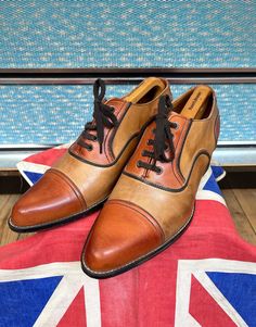 Absolutely stunning pair of 70s Dolcis brown/tan leather shoes in fabulous condition,just the lightest signs of wear,the different shades of brown over the light tan I am not sure if it's the shoes rubbing together or it's meant to be that way,either way they look amazing,lovely condition to the uppers and just light wear to the soles,the impressive heel is 5cm high. Circa 1976 maybe up-to 1978 Saturday night fever era,kind of a 70s version of the Co-respondent Spectator shoe. UK Size 9 Euro 43 Brown Platform Oxfords With Pointed Toe, Brown Almond Toe Heels For Business, Brown Cap Toe Oxfords With Rubber Heel, Brown Pointed-toe Dress Shoes With Rubber Sole, Brown Pointed Toe Dress Shoes With Rubber Sole, Brown Pointed Toe Dress Shoes, Brown Leather Platform Oxfords, Retro Brogue Detailing Closed Toe Oxfords, Retro Brogue Oxfords With Closed Toe