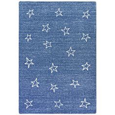 a blue rug with white stars on it