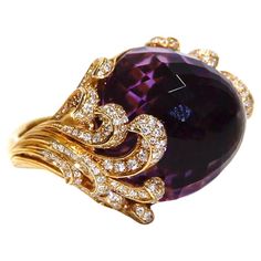 This Stunning Ring Constructed from 18kt yellow gold and adorned with diamonds and a stunning amethyst stone. this Origen maxi ring from Carrera Y Carrera will be the focus of your looks. White Diamonds 0.8ctw Cabochon Amethyst 29.81ct Retail $13,700.00 Amethyst Jewellery, Vintage Spoon Rings, Stunning Aesthetic, Butterfly Shoes, Carrera Y Carrera, Golden Ring, Spoon Rings, Amethyst Jewelry, Women Diamond