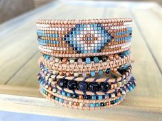 Navy Blue Tan Rose Gold Western Beaded Friendship Bracelet - Etsy Turkey Bohemian Woven Braided Bracelets, Bohemian Brown Woven Jewelry, Brown Bohemian Woven Beaded Bracelets, Bohemian Woven Bracelets With Round Beads, Brown Woven Bohemian Jewelry, Blue Bohemian Hand Wrapped Friendship Bracelets, Blue Bohemian Braided Bracelet, Blue Bohemian Braided Bracelets, Blue Bohemian Braided Woven Bracelets