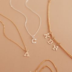 The Love Letter Necklace is a simple and delicate addition to your necklace layers. Everything about this beauty says 'sweet'. As we create our jewellery by hand, there will always be variation in alignment and spacing. The beauty of this process is that each KBN piece is unique to its wearer. Delicate Everyday Charm Necklaces With Initial Pendant, Delicate Everyday Charm Necklace With Initial Pendant, Dainty Charm Necklaces With Initial Pendant For Everyday, Everyday Tiny Initial Pendant Charm Necklace, Dainty Everyday Jewelry With Initial Pendant, Dainty Adjustable Initial Necklace For Everyday, Dainty 14k Gold Filled Initial Necklace For Everyday, Dainty Charm Necklaces With Initial Pendant, Dainty Everyday Initial Pendant Name Necklace