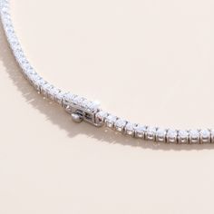 Callie Embrace modern elegance with our Lab Grown Diamond Tennis Necklace. This stunning piece features a continuous line of sparkling lab-grown diamonds, each meticulously set in a sleek and timeless design. Perfect for any occasion, this necklace offers the brilliance of diamonds with an eco-friendly touch. Whether you're dressing up for a special event or adding a touch of luxury to your everyday look, this tennis necklace is a versatile and sophisticated addition to your jewelry collection. Everyday Luxury White Jewelry With Lab Grown Diamond, Everyday Luxury White Lab Grown Diamond Jewelry, Luxury Lab Grown Diamond Tennis Necklace For Formal Events, Modern Round Cut Diamond Necklace For Formal Occasions, Timeless Cubic Zirconia Tennis Necklace For Anniversary, Timeless White Gold Tennis Necklace With Diamond Accents, Elegant Round Lab Grown Diamond Tennis Bracelet, Fine Jewelry Tennis Necklace With Brilliant Cut Cubic Zirconia, Formal Diamond White Lab Grown Diamond Tennis Necklace