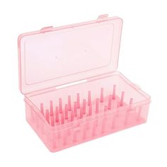 a pink plastic case filled with lots of nails