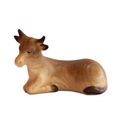 a small wooden statue of a cow laying down