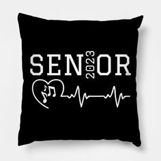 a black pillow with the word senior on it and a heart beat in white lettering