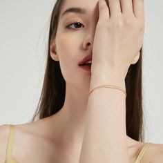 Delicate and simple gold snake bracelet. This is a fabulous bracelet to wear on its own or layer with other pieces. This timeless bracelet is a perfect addition to your jewelry collection! ………………………………….D E T A I L S• Materials: Stainless steel, 18k gold plating.• Length: 6.3 inches (16 cm) + extension 2 inches (5 cm)• This product is hypoallergenic, water and tarnish resistant Timeless Bracelet, Contemporary Fine Jewelry, Snake Bracelet, Minimal Jewelry, Gold Snake, Jewelry Branding, Gold Plating, Jewelry Care, Muse