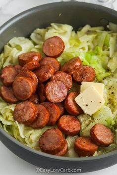 sausages, lettuce and cheese in a skillet