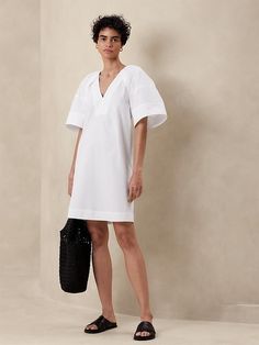 Poplin Knee-Length Dress | Banana Republic Factory Modern V-neck Spring Dresses, Modern V-neck Mini Dress For Spring, Modern V-neck Dresses For Daywear, Elegant Formal Dresses With Relaxed Fit, Elegant Relaxed Fit Mini Dress For Spring, Spring V-neck Mini Dress With Pleated Sleeves, V-neck Midi Dress With Pleated Sleeves For Work, Elegant Summer Shift V-neck Dress, Summer V-neck Midi Dress With Pleated Sleeves