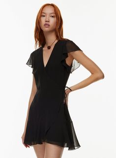 Flowy V-neck Dress With Ruffles For Summer, Elegant V-neck Chiffon Dress With Ruffle Hem, Elegant Ruffled Wrap Dress For Date Night, Chiffon V-neck Wrap Dress For Party, Summer V-neck Ruffle Dress For Garden Party, Summer Flowy V-neck Dress With Tie Waist, Flowy V-neck Ruffle Dress For Garden Party, Flowy Summer V-neck Dress With Tie Waist, Chic V-neck Wrap Dress With Ruffles