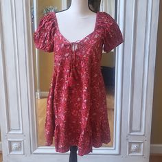 Nwt. Cute Floral Empire Waist. Sweet Ruffle At The Bottom Hem. Attached Tie Belt To Adjust Waist. Pretty String Tassels At Bust. Size Small. The Sleeves Can Be Worn On Or Off Shoulders Approximate Measurements In Photos! Red Short Sleeve Mini Dress For Vacation, Red Cotton Mini Dress, Red Flowy Mini Dress, Red Cotton Sundress Mini Dress, Red Empire Waist Shirt, Red Flowy Mini Dress With Short Sleeves, Red Fitted Bohemian Mini Dress, Flowy Red Mini Dress With Short Sleeves, Red Bohemian Mini Dress