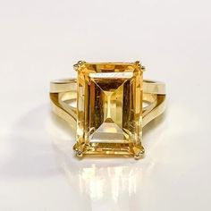 Natural Citrine Ring, Yello gold ring , Statement Ring, engagement ring, November Birthstone, Women's Ring, Women Citrine Ring,,men's ring  Gemstone - Citrine Stone Shape - Rectangle Stone Cut - Faceted Stone Color - Yellow  Stone Size - 14x10 mm ( Approx) Stone Quality - 100% Natural Note - Please Note that the stone used in this picture can vary in textures cause genuine gemstones may vary in texture. and the color may be slightly differ from the picture shown cause photographic effects. Metal Finish - High Polished gold  Metal Purity -yelloa gold  Stamped - 9k,14k,18k and 22k yellow gold on ring band Ring Size - All sizes available ( For custom ring size please contact ) Ring Style - Women's Ring Gents ring Formal Citrine Rings With Brilliant Cut, Luxury Yellow Gold Topaz Ring With Vvs Clarity, Elegant 14k Gold Baguette Cut Topaz Ring, Yellow Sapphire Ring With Center Stone In Yellow Gold, Classic Yellow Gold Promise Crystal Ring, Elegant Yellow Sapphire Ring With Prong Setting, Classic Radiant Cut Topaz Ring Gift, Formal Emerald Cut Solitaire Topaz Ring, Formal Emerald-cut Solitaire Topaz Ring