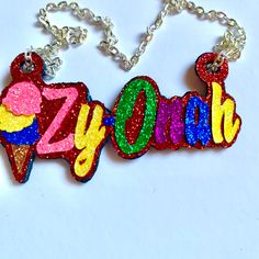 Personalized Ice Cream Name Necklace. Hand made and personalized to your liking. Every piece is made with love. **FREE SHIPPING OVER $35.00* Great gift for birthdays, sisters, Mother's Day, teenagers, kids, and much more! Please provide: 1. Name 2. Desired font 3. Main font color 4. Background/offset color 5. Chain length Rainbow print placement may vary Whimsical Personalized Necklaces For Gifts, Fun Handmade Charm Necklaces For Birthdays, Fun Charm Necklaces With Lobster Clasp For Gifts, Whimsical Personalized Necklace For Birthday Gift, Whimsical Personalized Jewelry For Birthday, Whimsical Personalized Jewelry For Birthdays, Custom Name Novelty Jewelry For Birthdays, Novelty Custom Name Jewelry For Birthdays, Personalized Multicolor Charm Necklaces For Valentine's Day