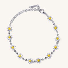 This fun silver daisy bracelet is a crowd favorite! Don't miss out on this cutie. Waterproof stainless steel 6 inches with 2.5 inch extender White Metal Jewelry For Spring, Cute Silver Flower Jewelry, Trendy Silver Flower Jewelry, Trendy White Daisy Shaped Jewelry, Trendy White Daisy-shaped Jewelry, Hypoallergenic White Jewelry For Spring, Spring Hypoallergenic White Jewelry, Spring Silver Bracelet Jewelry, Cute Silver Jewelry For Spring