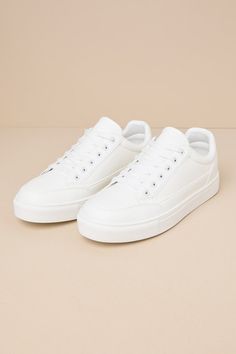 From summer sundresses to your fave denim, the Lulus Lalaa White Lace-Up Sneakers casually complete the cutest OOTDs! These classic kicks have a smooth faux leather construction that shapes a rounded upper, a lace-up vamp, and a low-cut collar. Seam details accent the sporty silhouette, all atop a sturdy bumper sole. 1. 25" rubber heel. Cushioned insole. Rubber sole has nonskid markings. Man made materials. Imported. Lulus | Lalaa White Lace-Up Sneakers | Size 7.5. White Shoes Low Heel, Axo Philanthropy, Cute White Shoes, Thrift Bundle, Classic White Sneakers, Mom Fits, Best White Sneakers, Custom Shoes Diy, Summer Sundresses