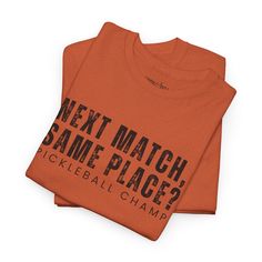 Showcase your love for pickleball and your competitive spirit with the Eddy and Rita Unisex Heavy Cotton T-Shirt featuring the bold slogan "Next Match Same Place Pickleball Champ." This t-shirt is crafted from premium heavy cotton, ensuring comfort and durability for both players and fans. Whether you're dominating on the court or supporting from the sidelines, this versatile graphic tee is designed to keep you stylish and comfortable. Perfect for casual wear and sports activities, it's a must-h Sports Season T-shirt With Team Name For Pickleball, Pickleball Sports Season Graphic T-shirt, Pickleball Sports Season Graphic Print T-shirt, Crew Neck Tennis T-shirt With Team Name, Crew Neck Tennis T-shirt With Letter Print, Pre-shrunk Crew Neck Tennis Tops, Sports Activities, Pickleball, Cotton T Shirt